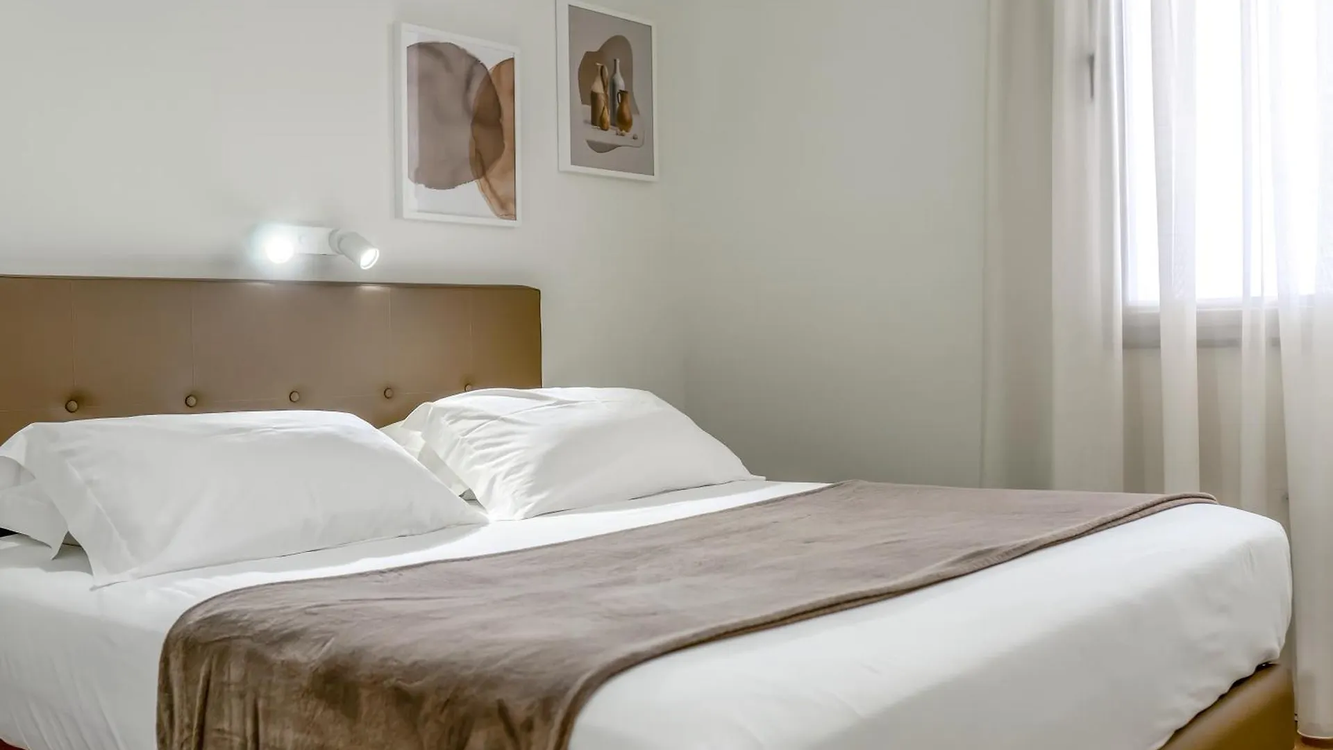 The Rooms Serviced Apartments Tirana